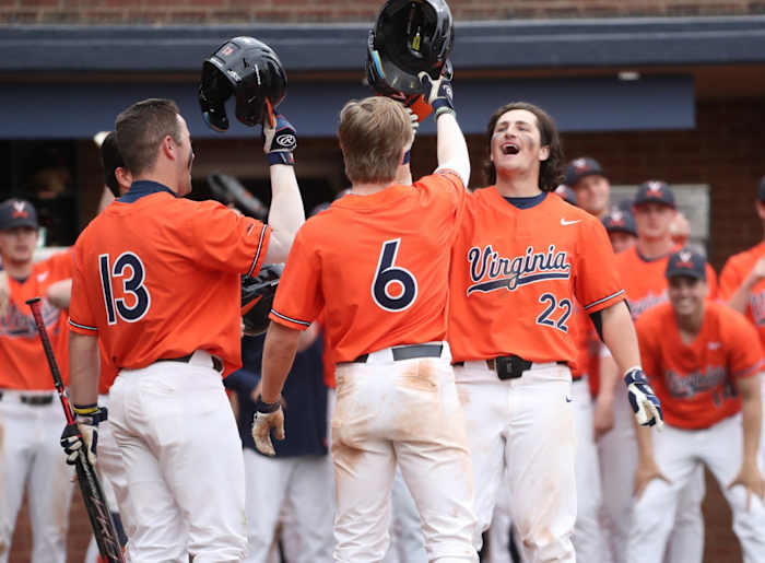 This year's hottest rising team, Virginia, celebrates a home run from freshman Griff O'Ferrall (6).